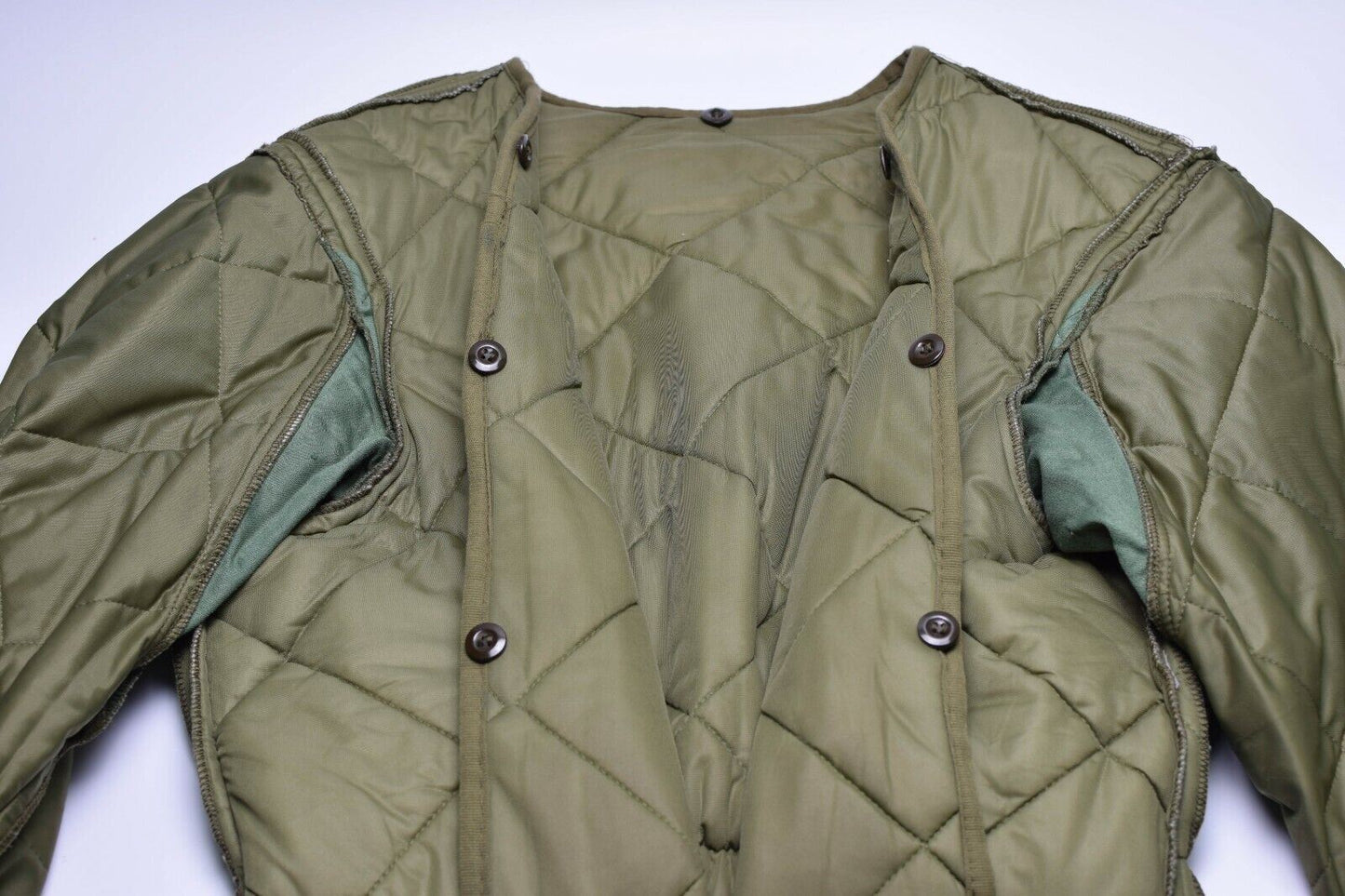 The lining of the Polish army jacket is quilted Olive