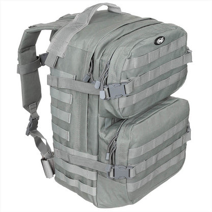 MFH US Assault II taktinė kuprinė 40L su MOLLE sistema, reguliuojamomis petnešomis ir gertuvės skyriumi.