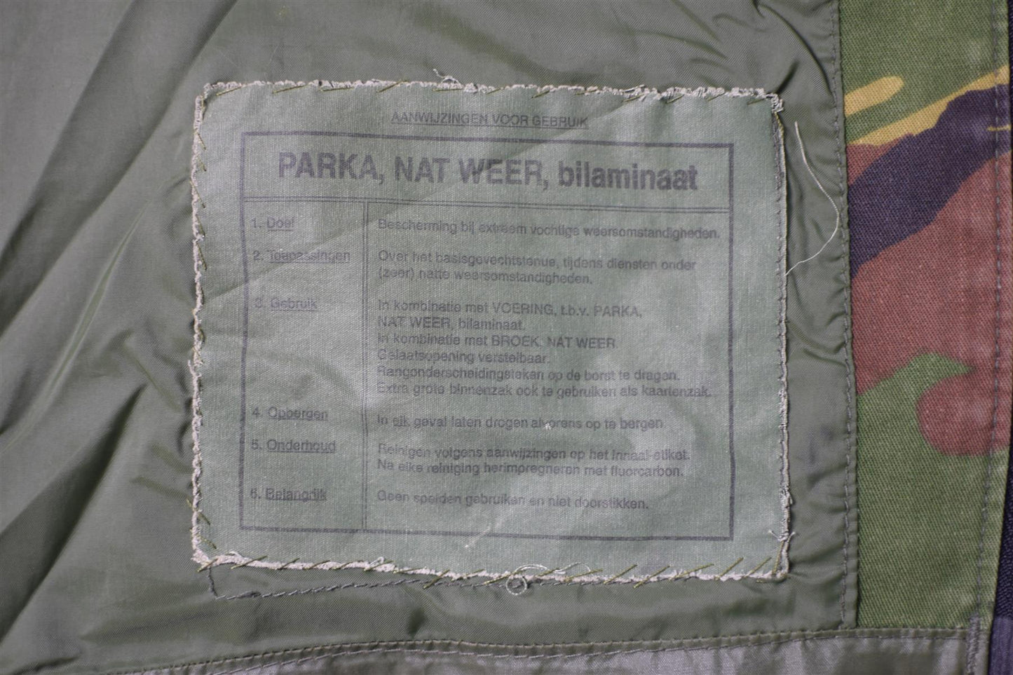 Nyderlandų kariuomenės GoreTex parka neperšlampamas švarkas DPM marginimo su originalia priežiūros etikete.